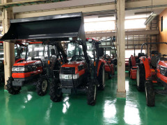 Kubota Tractors with cabin in garage Kubota tractors with cabin